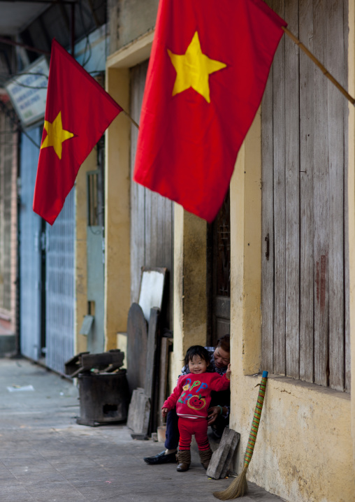 Mother and her young daughter smiling for tet day, Hanoi, Vietnam