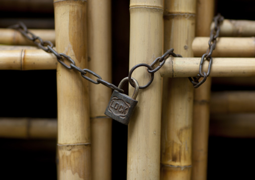 Locker on a bamboo door, Hanoi, Vietnam