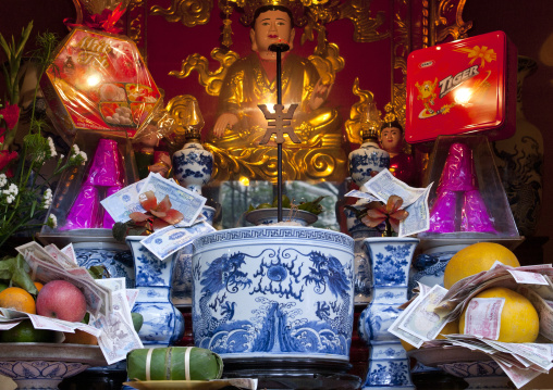 Offerings in a bhuddhist temple, Hanoi, Vietnam