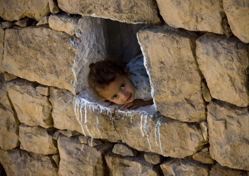 Smiling Girl Showing Up At The Window, Kholan, Yemen