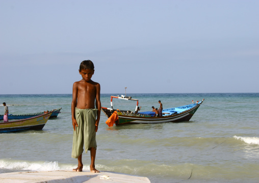 Serious Yemeni Kid Standing On A Beach, Al Khukaha, Yemen