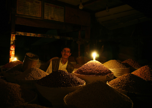 Seller Lighting Candles Because Of An Electricity Shortage, Sanaa Souq, Yemen