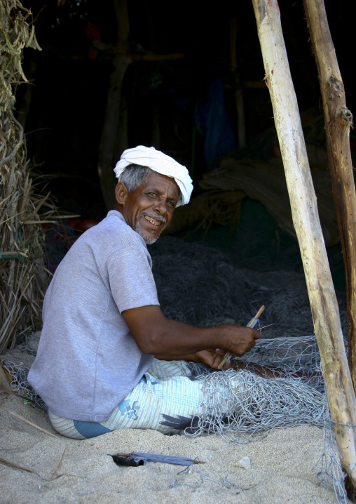 Smiling Fisherman Mending His Net, Al Khukaha, Yemen